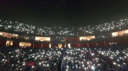 A picture of stadium crowd with everyone holding their phone lights in the air. Looked very pretty.