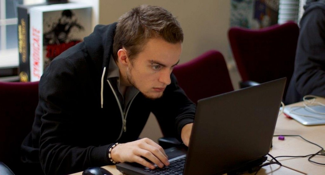 A picture of me (Luc Shelton) staring intently at the laptop computer screen during the final hours of the 48 hour game jam.