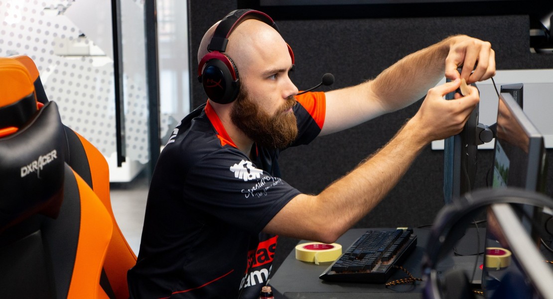 Anthony "MassE" Massey setting up his monitor ahead of the tournament. The picture was taken inside the conference room we were competing from.